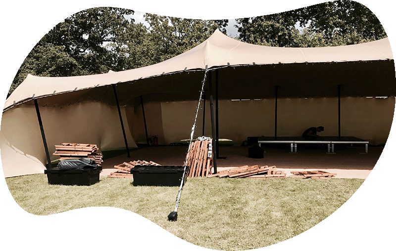Outdoor event shelter setup in progress – part of JET's event equipment hire West Midlands services
