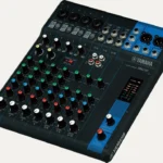 Angled view of Yamaha MG10 compact audio mixer with microphone and line inputs